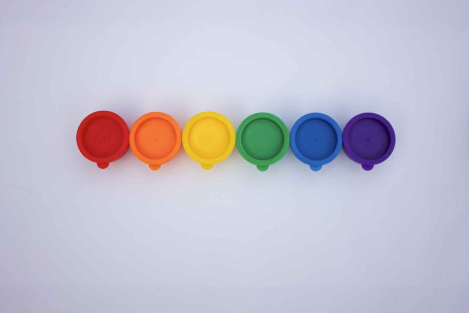 rainbow-row-of-bright-and-colorful-paints-against-5MDK3Y2-1.jpg